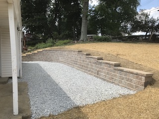 Retaining wall and rear yard grading - After